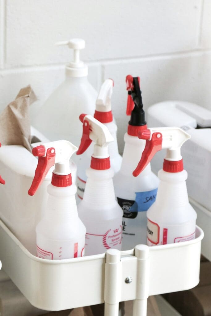 Spray bottles of cleaners.