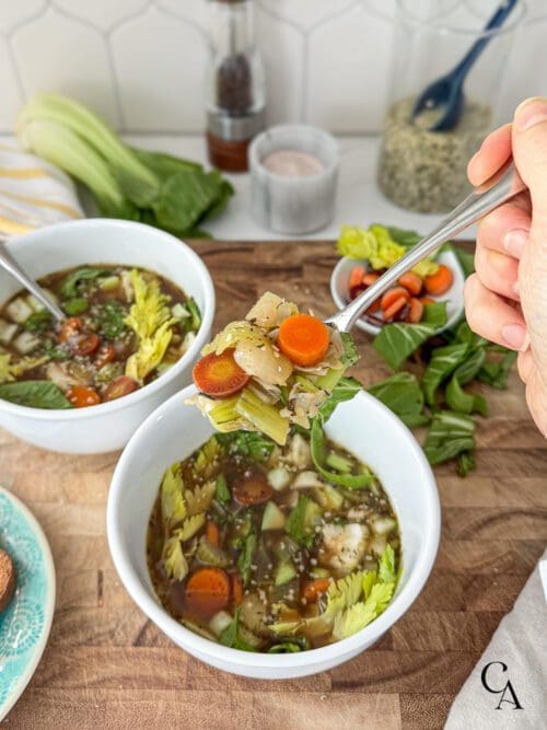 A spoonful of veggie soup.