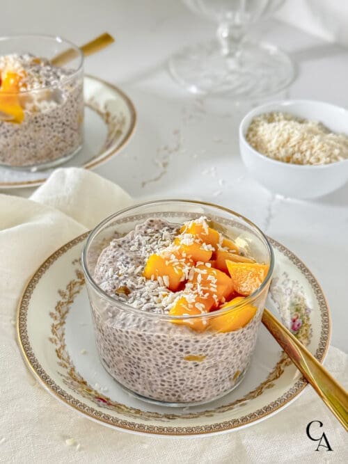Creamy chia pudding with mango and shredded coconut.