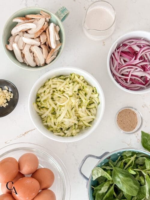 Ingredients to make a zucchini frittata.