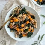 A bowl of ground turkey, sweet potato and kale.